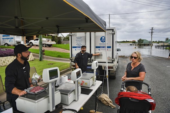 Local Wilberforce resident Michelle Lonsdale-Smith and 18 month old granddaughter Isabel, dropped in to buy mince and eggs from twin brothers Sam and Dean of M&A Butchery's open air pop-up store to keep locals in fresh meat and eggs, on Wednesday.