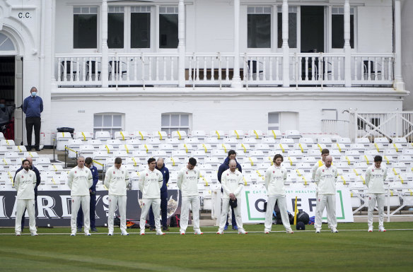 Durham County cricket players stand for a minute’s silence after the announcement of the death of the Duke of Edinburgh, at Trent Bridge in Nottingham, England.