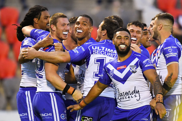 The Bulldogs celebrate another try.