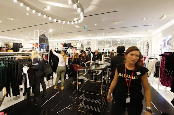 Braving the rain for Balmain at H&M