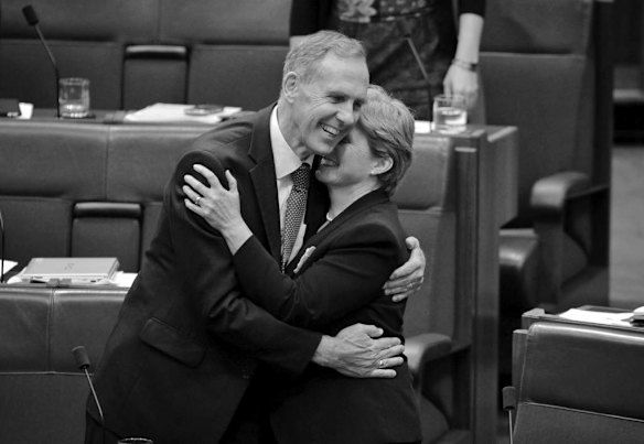Greens Leader Senator Bob Brown embraces Deputy Greens Leader Senator Christine Milne after the Carbon Tax Bills passed the Senate at Parliament House Canberra on Tuesday 8 November 2011.