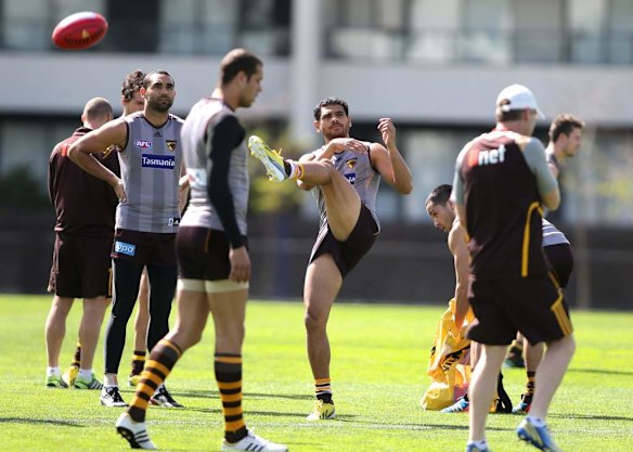 Cyril Rioli lets fly on a shot at goal  during a Hawthorn Hawks AFL training session at Waverley Park.