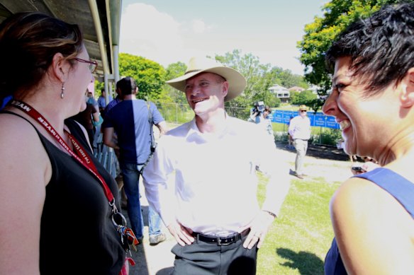 Premier Campbell Newman speaking to people on election day at Newmarket State School, Brisbane.