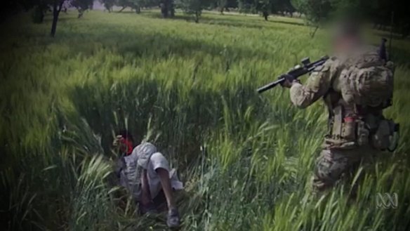 A still from the ABC’s Four Corners showing the alleged war crime murder of Dad Mohammad.