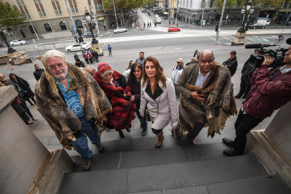 Greens MP Lidia Thorpe with Aboriginal clan elders on the steps of Parliament in May. 