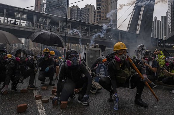 Protesters clash with police in the Tsuen Wan district of Hong Kong, Aug. 25, 2019. 