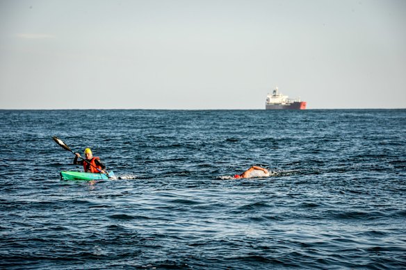 Swimmer Grant Siedle re-enacts the swim of Doug Mew across the rip from Point Lonsdale to Point Nepean on the same day 13th June just wearing speedos. Photo: Justin McManus