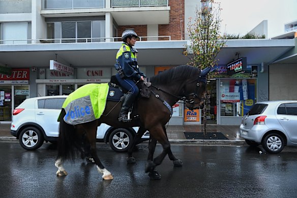 NSW Mounted Police patrol the streets of Fairfield during Sydney's COVID-19 lockdown. Police increase their presence after numbers grow in Sydney's South West.