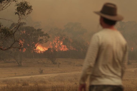 Bombay residents watch as the North Black Range bushfire threatening properties at Bombay, NSW.