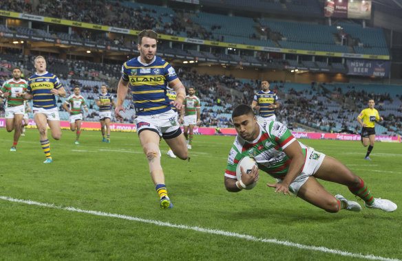 Family gathering: Robert Jennings dives over for one of his four tries against the Eels... who two of his brother play for.