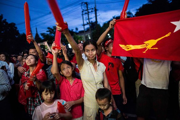 People take part of the rally outside the National League for Democracy (NLD) office after Myanmar's first free and fair election in Yangon, Myanmar.