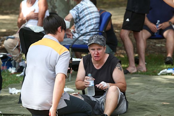 Injured attended to in local park, after a train hit a buffer at Richmond Station. 