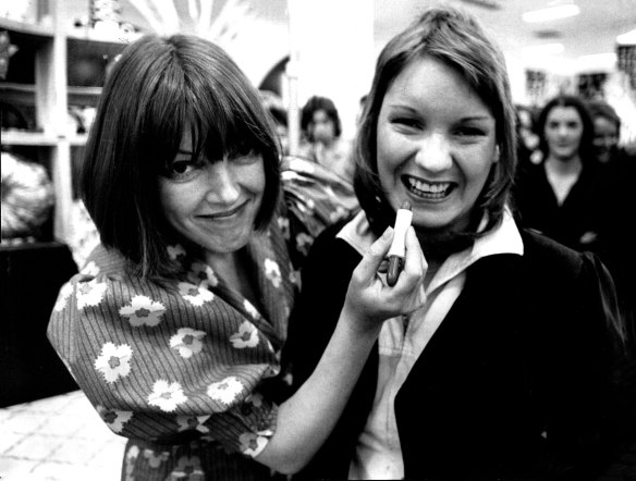 Mary Quant tries out her new Special Recipe lipstick on Toni Morton, 19, of Randwick. October 10, 1972. 