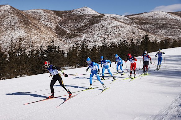 German Antonia Fraebel leads the women's cross-country skiing 30k mass start free field on day 16.