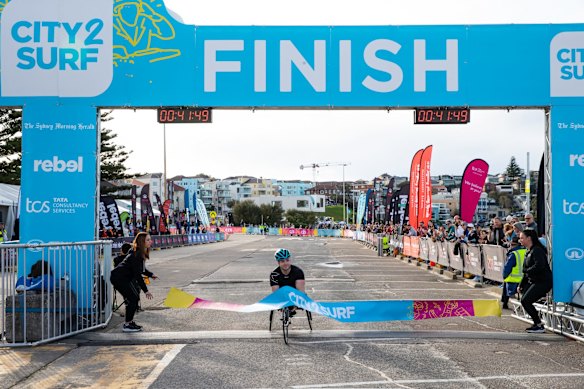 Wheelchair division winner Sam Rizzo crosses the line.