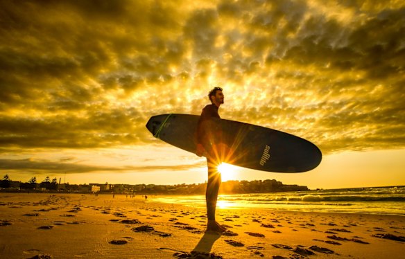 Bondi local Daniel Escobar observes the swell before heading out for a surf at Bondi. 2nd October 2015.