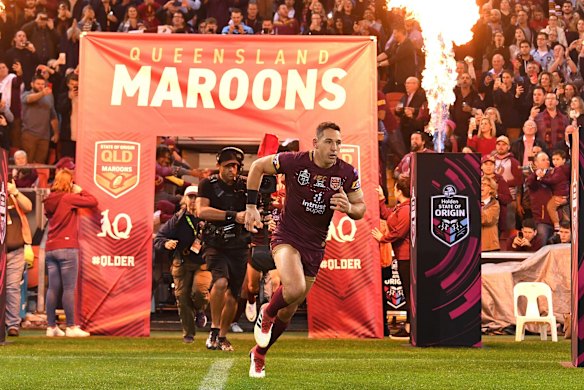 Billy Slater of the Maroons runs out