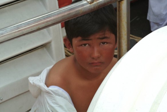 Omed, 10, lost his father, uncle and cousin on the asylum boat.