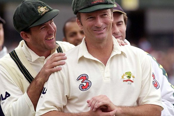 Past and present ... then Australia captain Steve Waugh, right, and Ponting during the official presentation following Waugh's final Test match - the fourth Test against India at the Sydney Cricket Ground in January 2004.