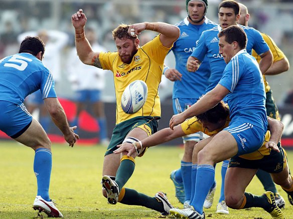 Scott Higgnibotham goes for the ball.