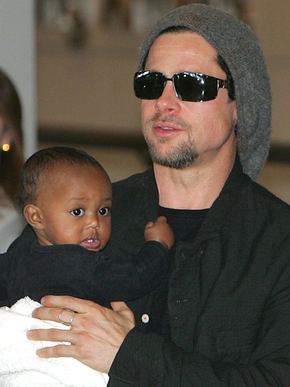 Brad Pitt holds adopted daughter Zahara in 2005. 