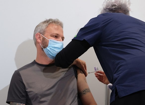 Victorian Chief Health Officer Brett Sutton receives his first COVID-19 vaccination at the Royal Exhibition Building in Carlton on April 21, 2021 in Melbourne, Australia. Mass-vaccination hubs have opened in Melbourne and Geelong today, open to people eligible for the COVID-19 vaccine. 
