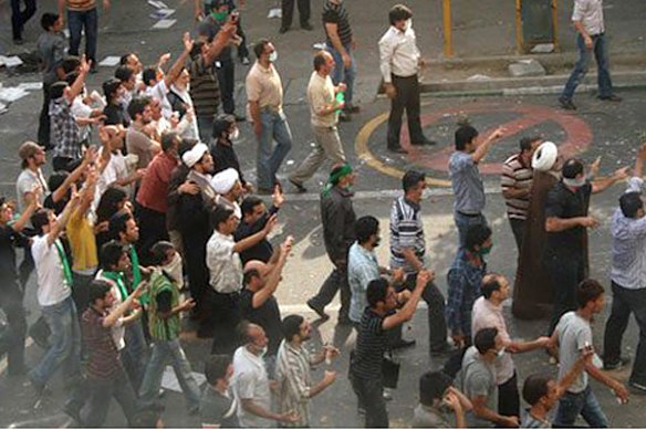 Protesters gesture on a street in Tehran in this undated photo uploaded onto Twitter June 21, 2009.  Iranian opposition leader Mirhossein Mousavi urged his supporters on Sunday to continue their protests over a disputed presidential election, in a direct challenge to the leadership of the Islamic Republic.