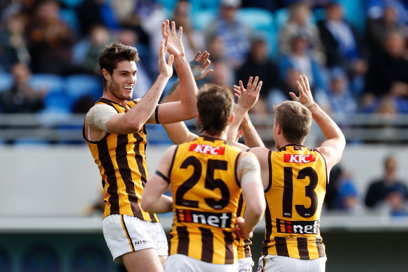 Ruckman Ned Reeves, the tallest man to ever play for the Hawks, showed he had a few tricks as a forward against the Kangaroos.