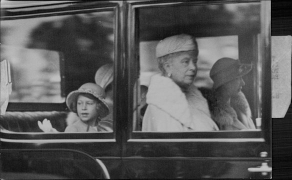 The Queen arrives at Horse Guards Parade with the Princess Royal, for the annual trooping the colour ceremony, July 23, 1934. 