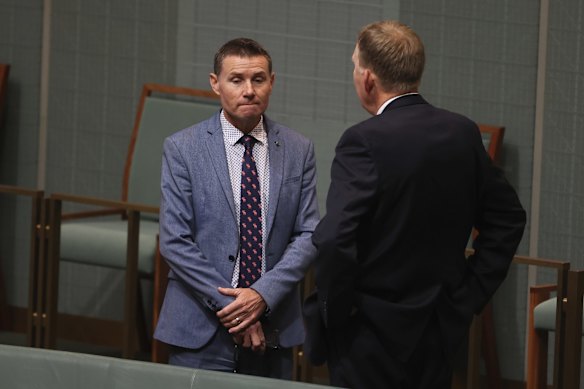 Member for Bowman, Andrew Laming, in discussion with Chief Government Whip Bert van Manen during a division in the House of Representatives on Thursday 3 June.