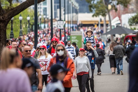 Footy fans attend the AFL Grand Final parade 
