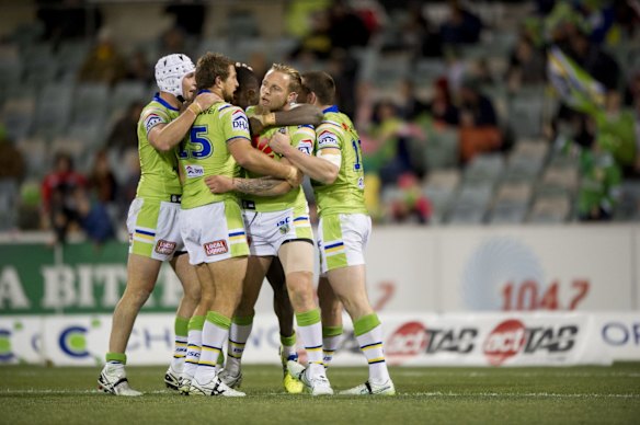 Canberra Raiders congratulates Blake Austin after scoring a try.