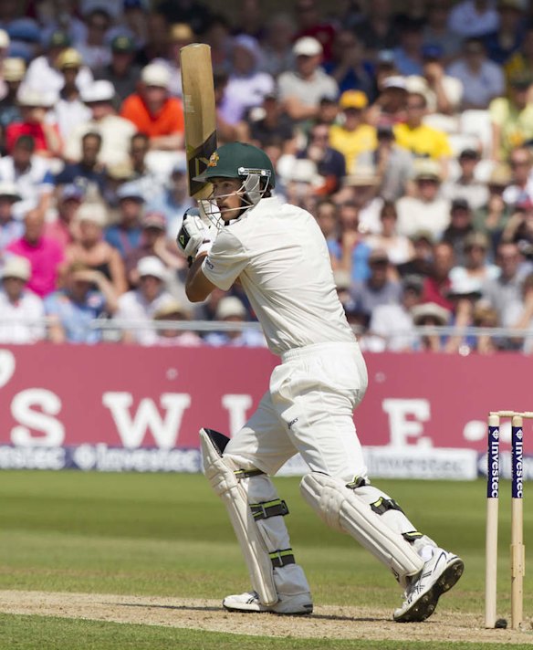Australia's Ashton Agar plays a shot off the bowling of England's Steven Finn.