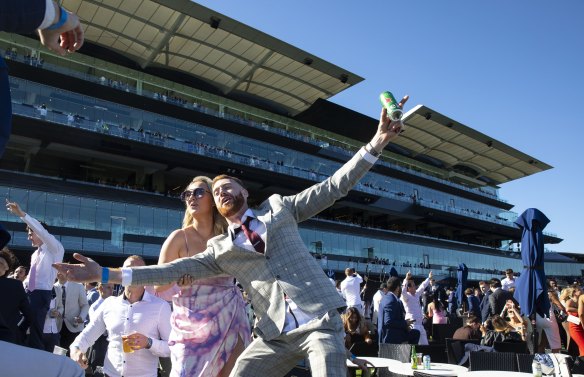 The Everest crowd sings Sweet Caroline after Nature Strip won the $15 million race.