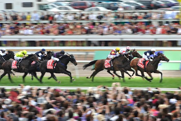 Green Moon kicks on 200m from the line to win.