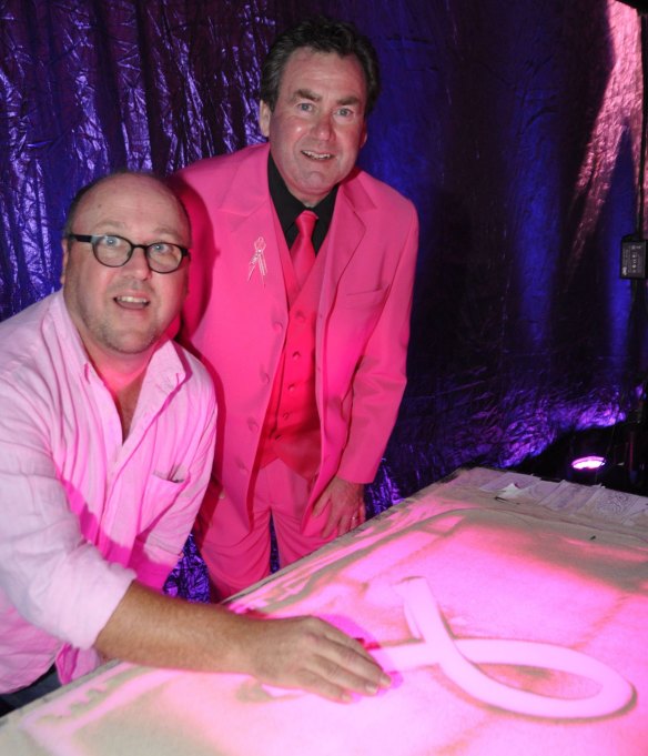 24 October 2012. Canberra Times Photo by LYN MILLS for SOCIALS Pink Dinner at the Hyatt Hotel Sand Artist Brett Bowler with MC Paul Walshe