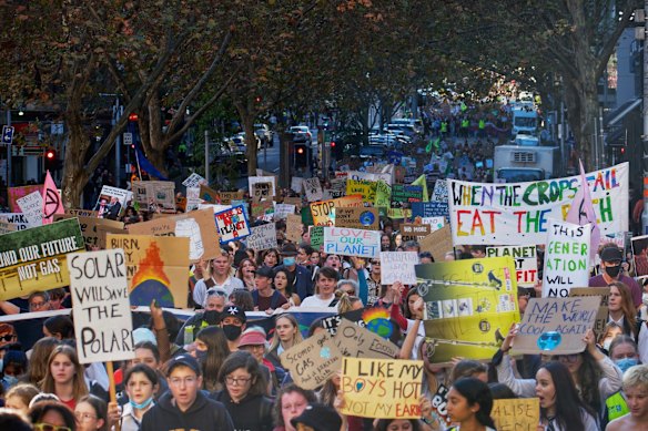 An estimated crowd of five thousand gathered at Treasury Gardens on Friday for Climate Strike, a rally and march organised by School Strike 4 Climate after the recent federal budget announcement. 