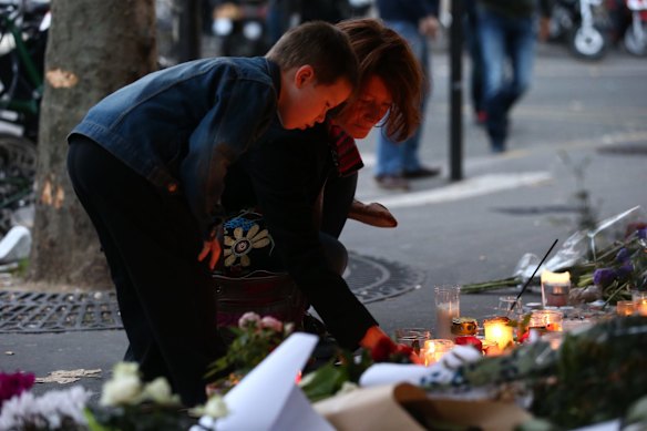 Candels and flowers at La Belle Equipe in Paris France.