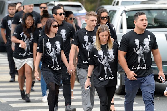 Mourners arrive with shirts dedicated to Tara Brown at the funeral service for Gold Coast woman Tara Brown who was allegedly bashed to death by her ex-partner Lionel Patea.