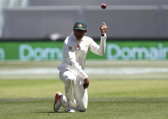 What a catch: Usman Khawaja removed Virat Kohli with a spectacular catch in Adelaide, but he needs to do more with bat in hand in Perth.