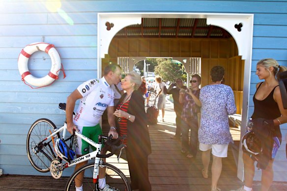 Pollie Pedal Ride with the Opposition Leader of the Liberal Party Tony Abbott, ariving at Palm Beach jetty on a ferry from Ettalong. Abbott is greeted by the Federal member for Mackellar, Bronwyn Bishop, and his daughter Frances on Sunday 10th of April 2011.