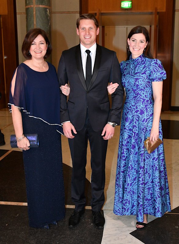 Liberal members Sarah Henderson, Andrew Hastie and Nicolle Flint arrive for the annual Mid Winter Ball at Parliament House in Canberra, Wednesday, September 12, 2018.