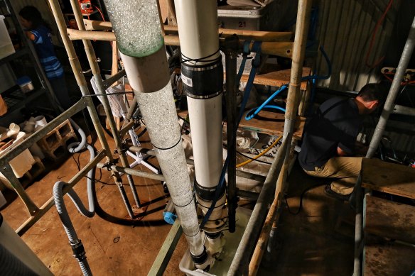 UNSW’s Stefan Felder and Maryam Farzadkhoo prepare a fish lifting tube experiment designed to enable native fish to reach higher water levels such as dams or weirs.

