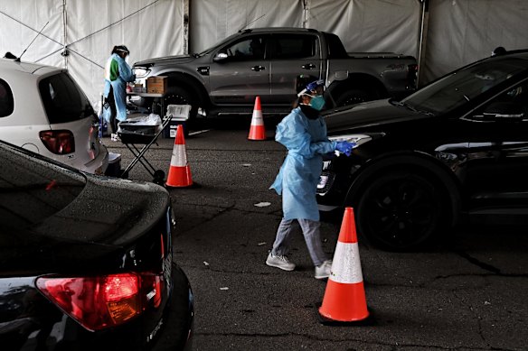 COVID testing at Merrylands Park Drive-through Clinic, as NSW Premier Gladys Berejiklian announces tighter restrictions for Greater Sydney in the face of a COVID Delta outbreak across the city.