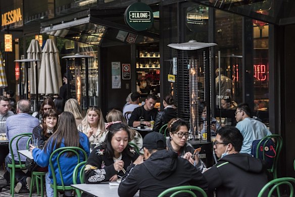 Buzzing restaurants in Chinatown, Sydney, as customers slowly return.