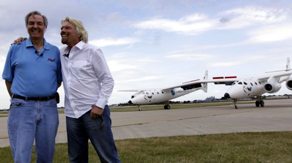 Burt Rutan, the designer of Virgin Mother Ship Eve and Richard Branson celebrate as the plane, also known as White Knight Two, taxis in at Wittman Field.