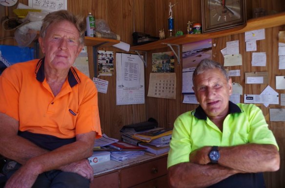 Maramingo Creek timber worker Fred Becker (right), pictured here with his brother Ron, died from a suspected heart attack after protecting his home from Tuesday's fires. 