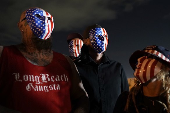 Supporters of President Donald Trump protest in front of the Clark County Election Department in North Las Vegas, Nevada. 