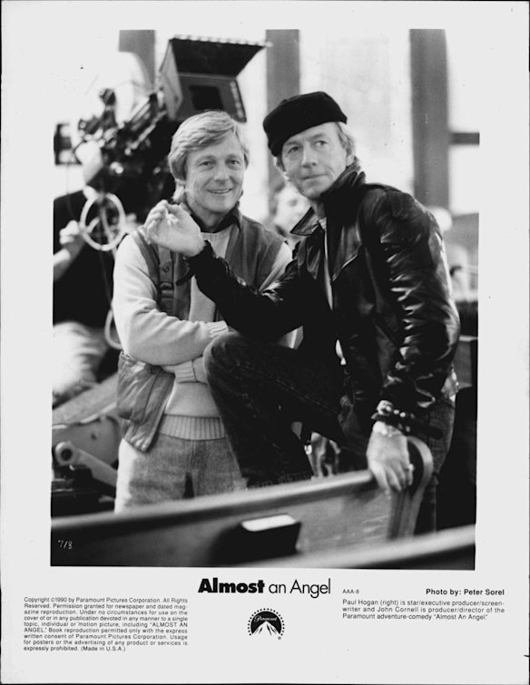 Paul Hogan (right) is star/executive producer/screen writer and John Cornell is producer/director of the Paramount adventure-comedy "Almost An Angel". December 23, 1990.