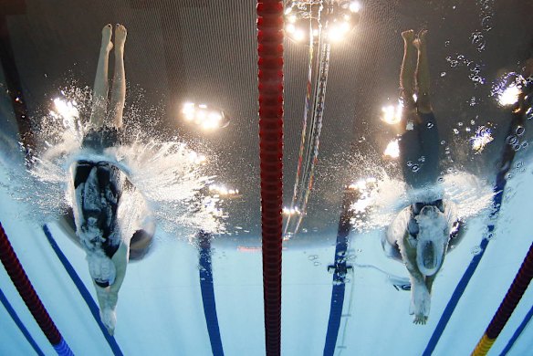 Netherlands' Ranomi Kromowidjojo, right, and United States' Missy Franklin start in the women's 100m freestyle swimming final.
